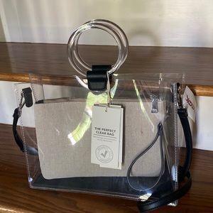 Clear Bag with Cloth organizer on inside.